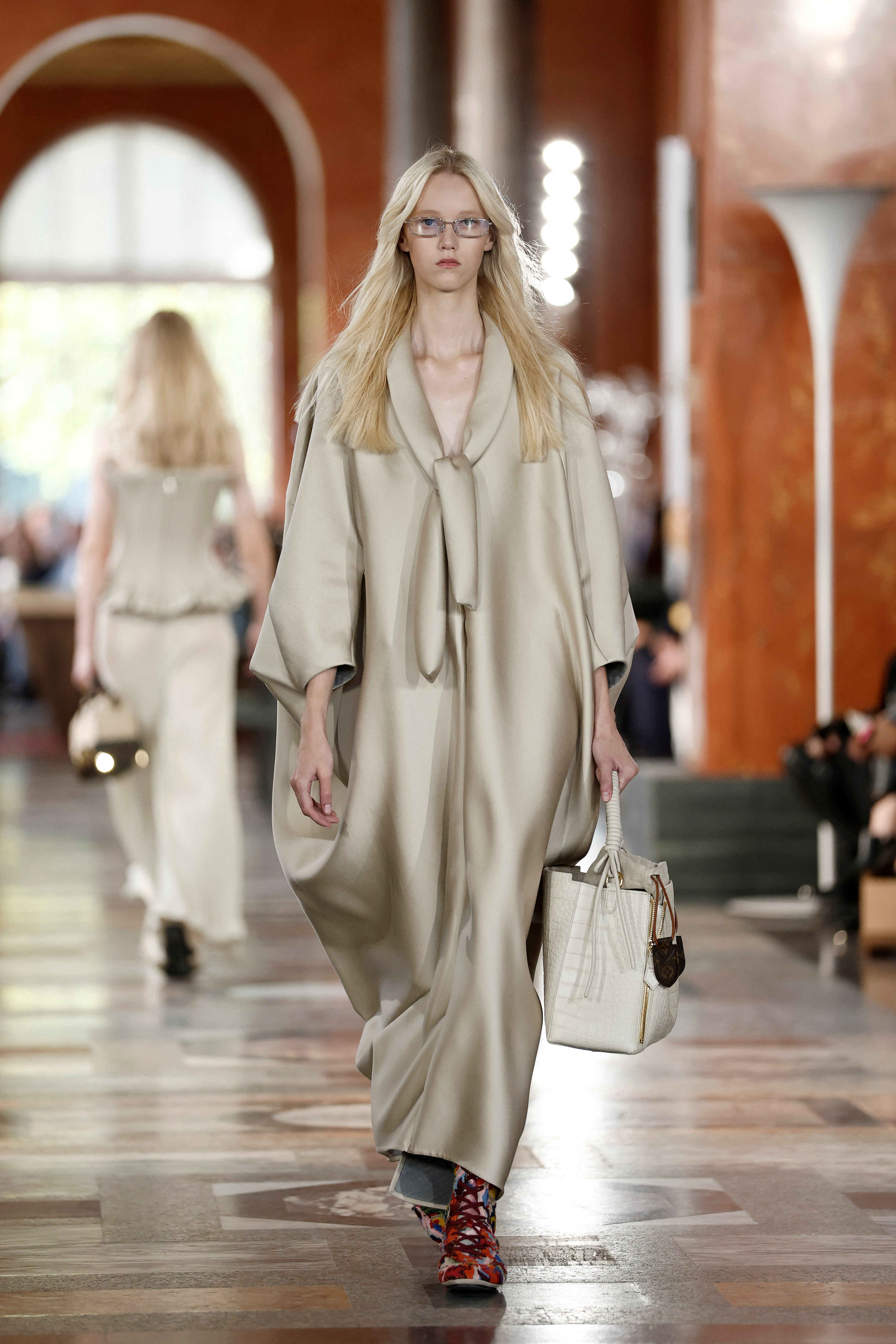 A model presents a creation by designer Nicolas Ghesquiere as part of his SpringSummer 2026 Women's ready-to-wear collection show for the fashion house Louis Vuitton during Paris Fashion Week in Paris, France, September 30. (Reuters)